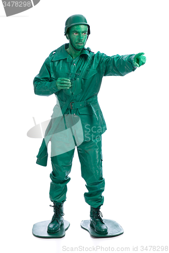 Image of Man on a green toy soldier costume