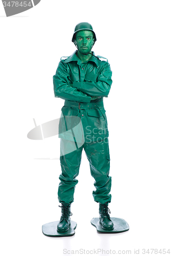 Image of Man on a green toy soldier costume