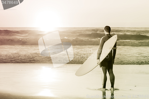 Image of Surfer watching the waves