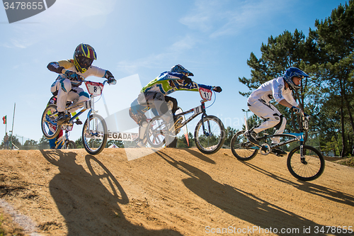 Image of Elite riders jumping