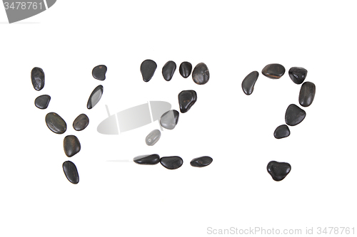 Image of stone alphabet from black stones