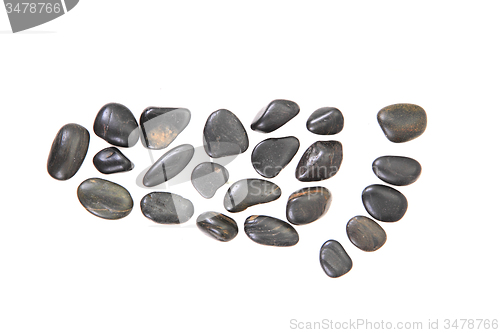Image of foot from black stones isolated