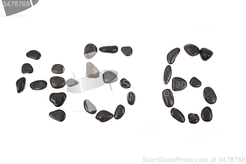 Image of stone alphabet from black stones