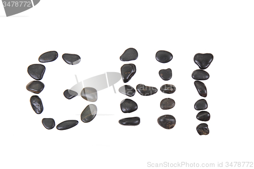 Image of stone alphabet from black stones
