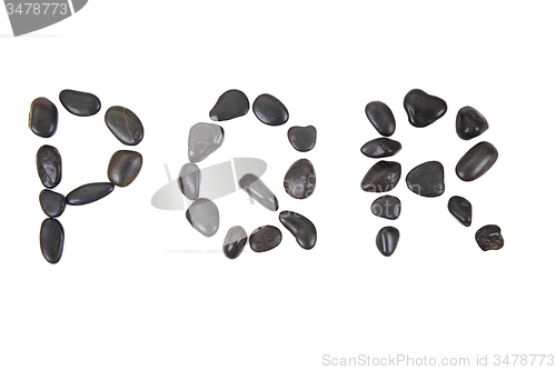 Image of stone alphabet from black stones