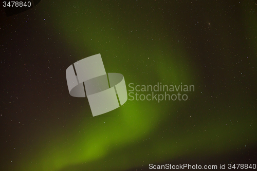 Image of Dynamic aurora with bright stars in Iceland