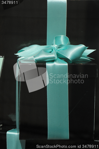 Image of Gift box with blue ribbon
