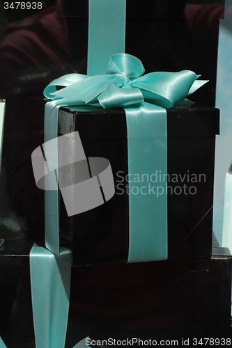 Image of Gift box with blue ribbon