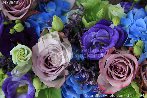 Image of Blue and purple bridal bouquet