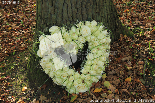 Image of Heart shaped sympathy flowers