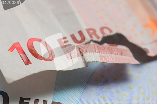Image of Torn euro note