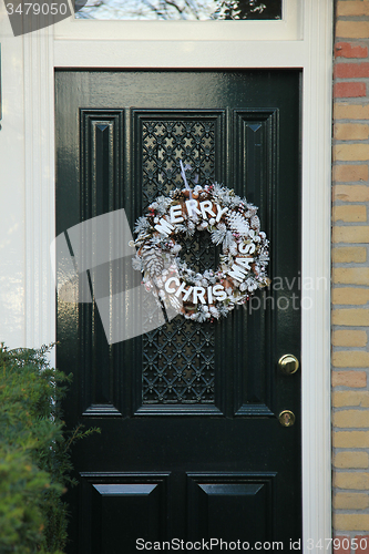 Image of Merry Christmas decoration on front door