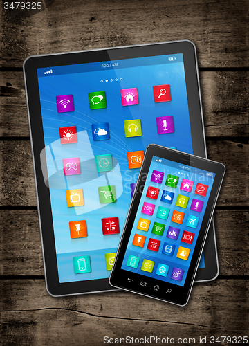 Image of Smartphone and digital tablet PC with desktop icons on a dark wo