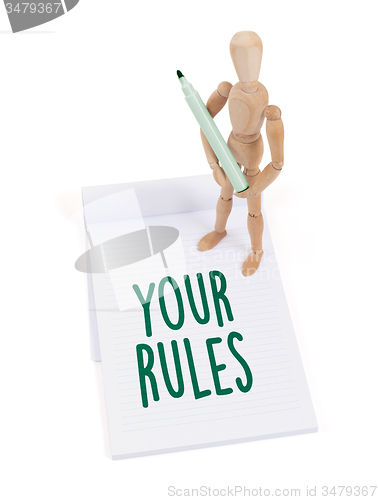 Image of Wooden mannequin writing - Your rules