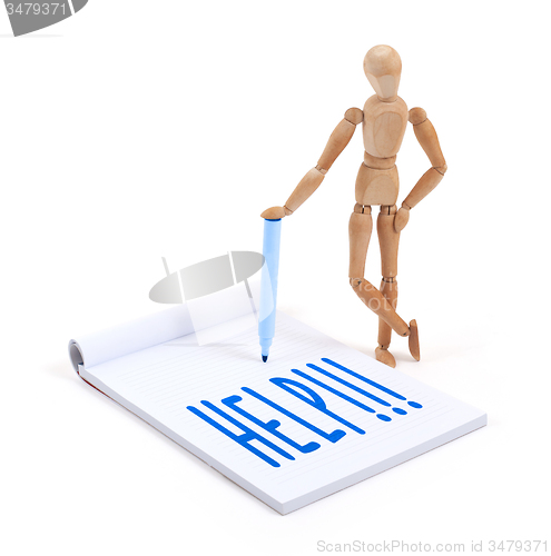 Image of Wooden mannequin writing - Help