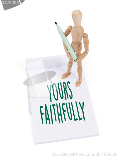 Image of Wooden mannequin writing - Yours faithfully