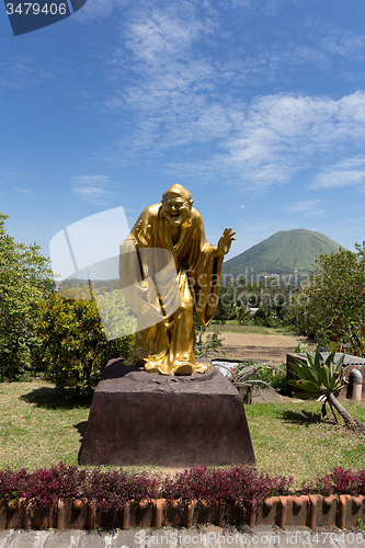 Image of fat monk statue in complex Pagoda Ekayana