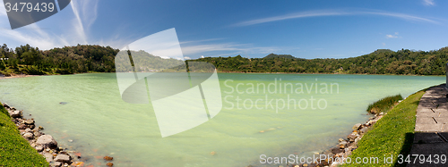 Image of wide panorama of sulphurous lake - danau linow indonesia