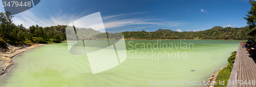 Image of wide panorama of sulphurous lake - danau linow indonesia