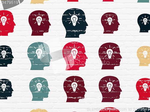 Image of Information concept: Head With Light Bulb icons on wall background
