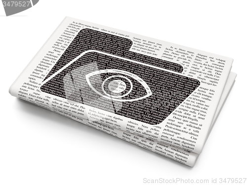 Image of Business concept: Folder With Eye on Newspaper background