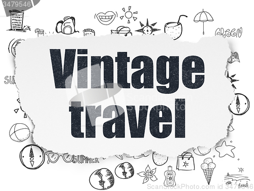 Image of Vacation concept: Vintage Travel on Torn Paper background