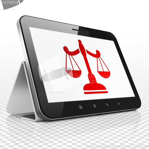 Image of Law concept: Tablet Computer with Scales on display