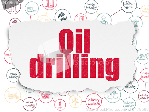 Image of Manufacuring concept: Oil Drilling on Torn Paper background