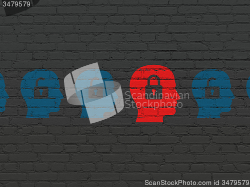 Image of Finance concept: head with padlock icon on wall background