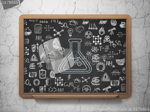 Image of Science concept: Flask on School Board background