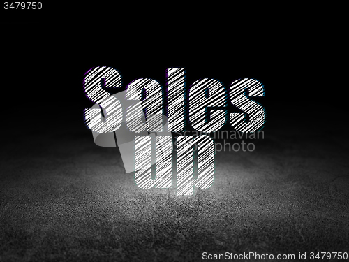Image of Advertising concept: Sales Up in grunge dark room