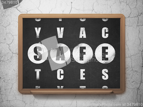 Image of Privacy concept: word Safe in solving Crossword Puzzle