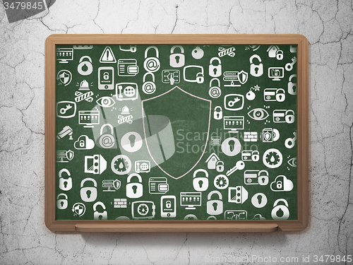 Image of Protection concept: Shield on School Board background