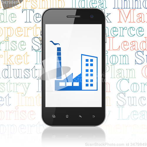 Image of Business concept: Smartphone with Industry Building on display