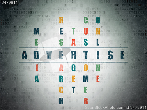 Image of Advertising concept: word Advertise in solving Crossword Puzzle
