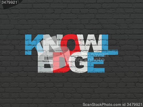 Image of Education concept: Knowledge on wall background