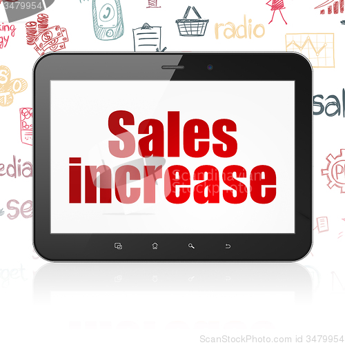 Image of Marketing concept: Tablet Computer with Sales Increase on display