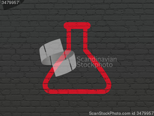Image of Science concept: Flask on wall background