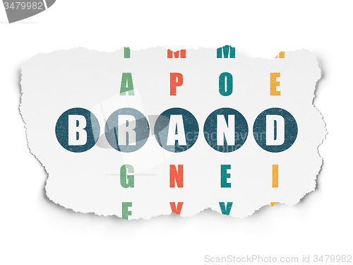Image of Advertising concept: word Brand in solving Crossword Puzzle