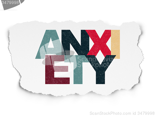Image of Medicine concept: Anxiety on Torn Paper background
