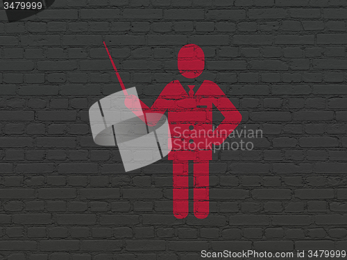 Image of Education concept: Teacher on wall background