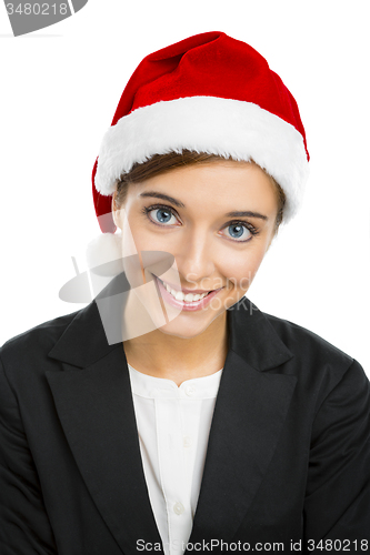 Image of Beautiful woman with a Santa hat