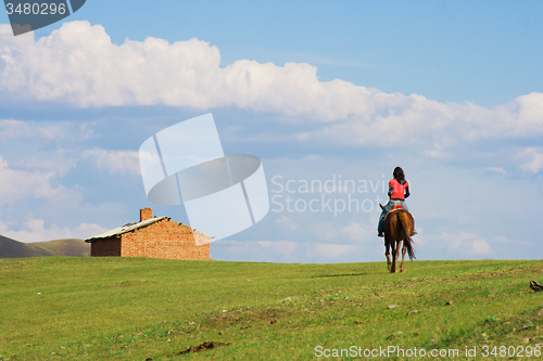 Image of Girl Ridding Horse