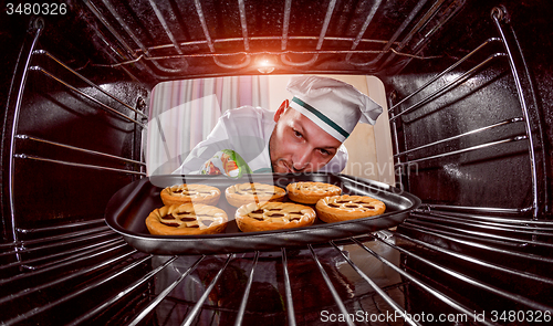 Image of Chef cooking in the oven.