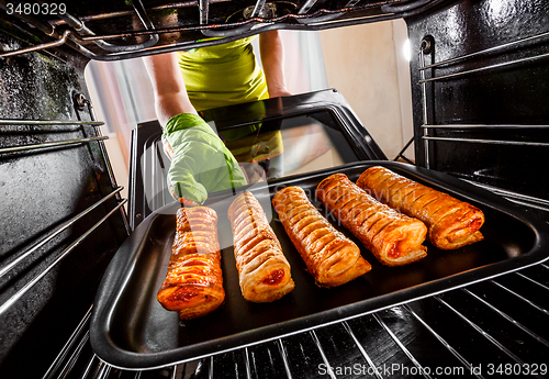 Image of Cooking in the oven at home.