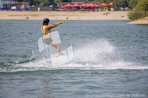 Image of Young girl wakeboarder