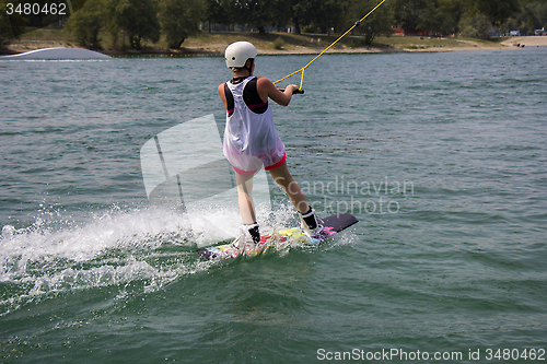 Image of Young girl wakeboarder