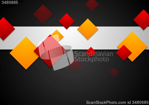 Image of Red and orange geometric squares on black background