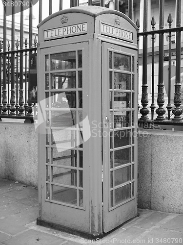 Image of Black and white Red phone box in London