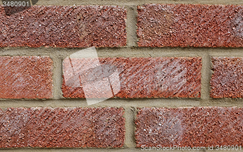 Image of Coarse red brick wall background